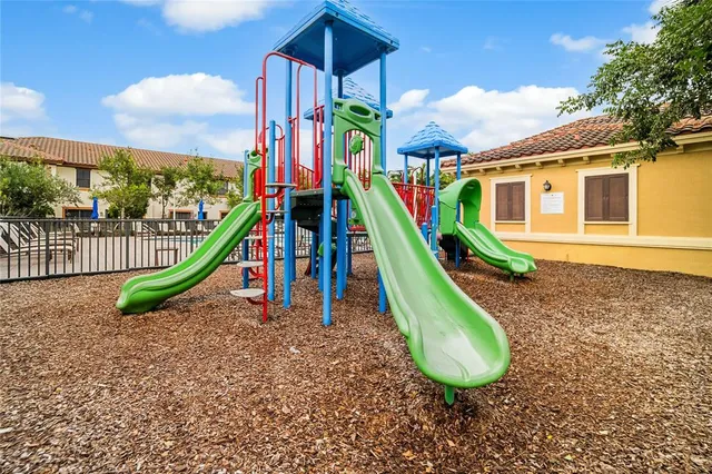 an aerial view of a house with a lake view