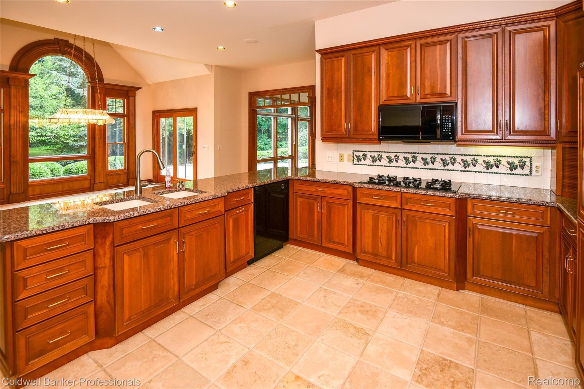 9250 Fox Hollow Road Clarkston, MI 48348 - Photo 12 of 42 Kitchen with view of dining nook