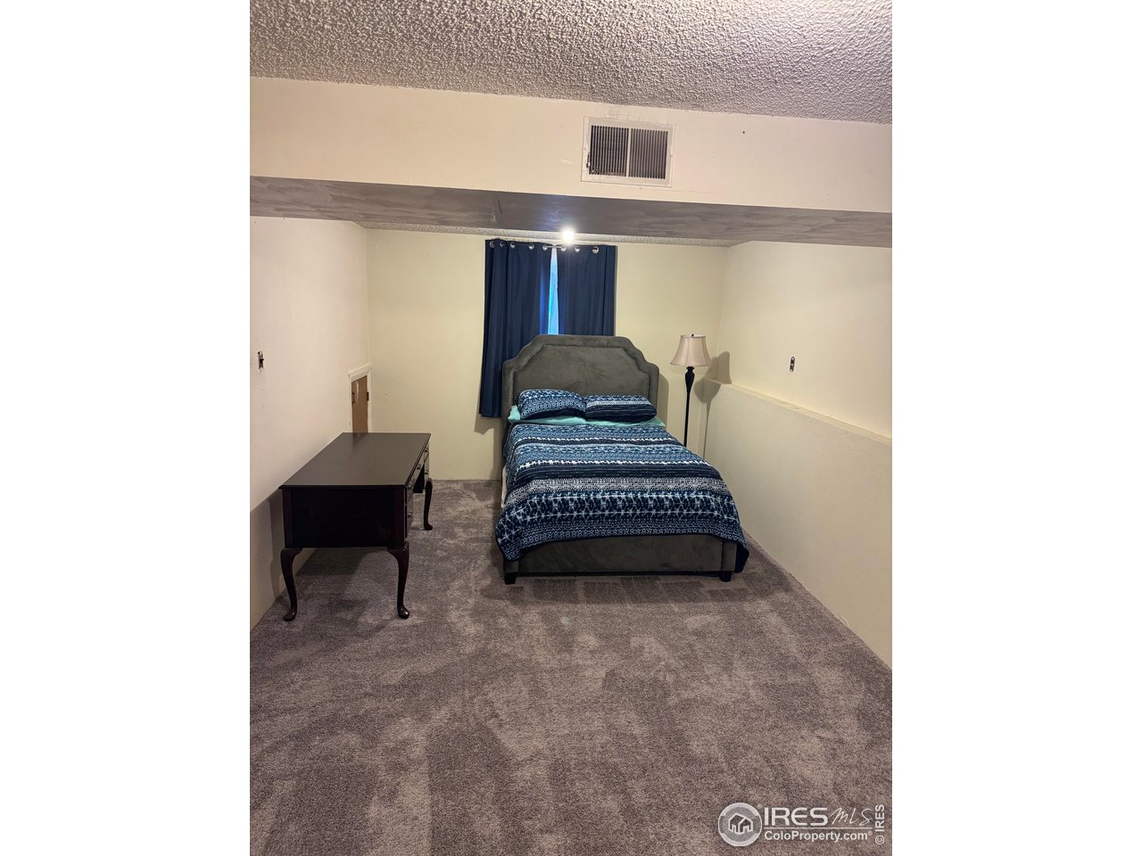 1924 30th Street Road Greeley, CO 80631 - Photo 16 of 19 a view of a hallway with seating space