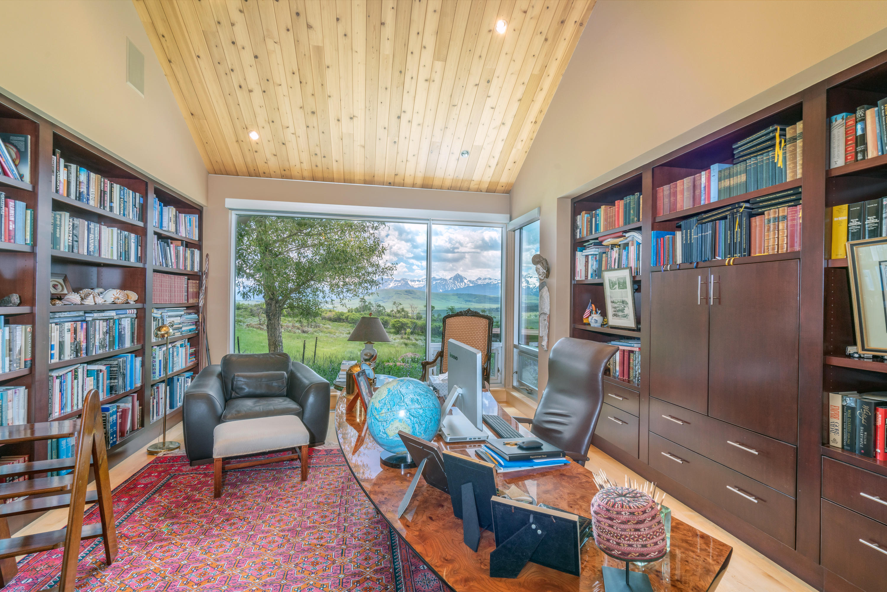 1804 Ranch Road Placerville, CO 81430 - Photo 16 of 52 a work room with furniture window and book shelf