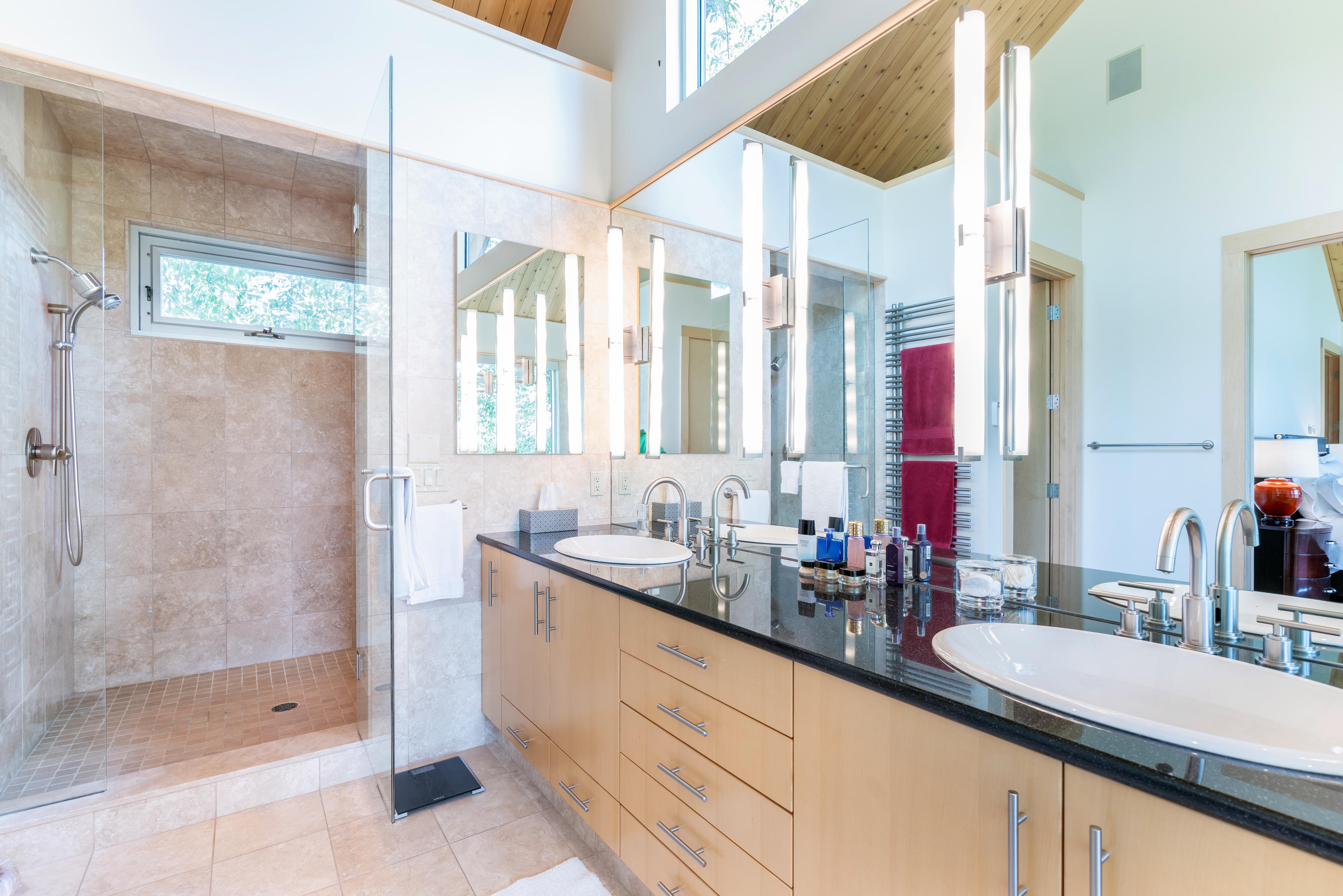 1804 Ranch Road Placerville, CO 81430 - Photo 21 of 52 a bathroom with a double vanity sink mirror and shower