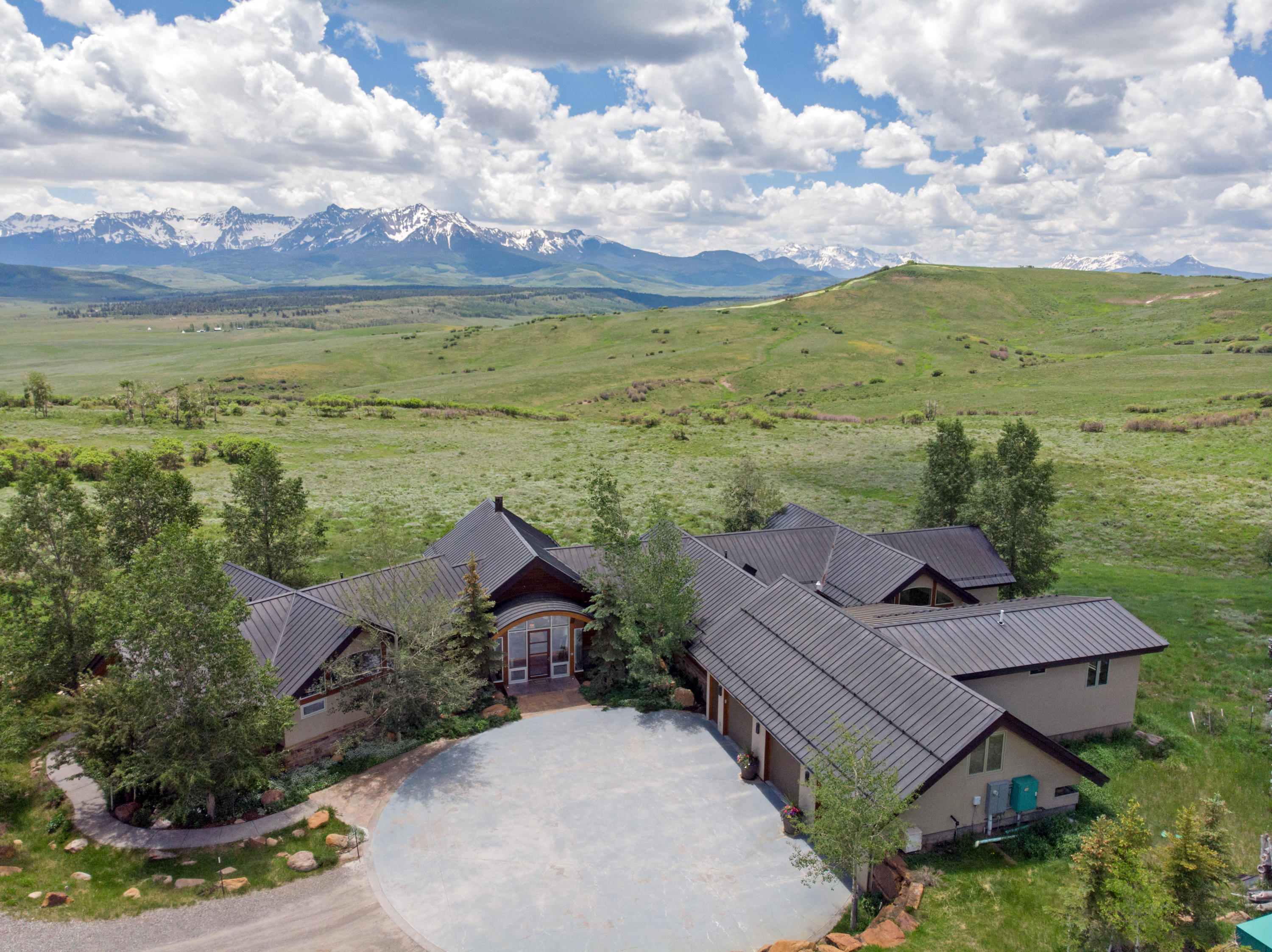 1804 Ranch Road Placerville, CO 81430 - Photo 45 of 52 an aerial view of a house with a garden