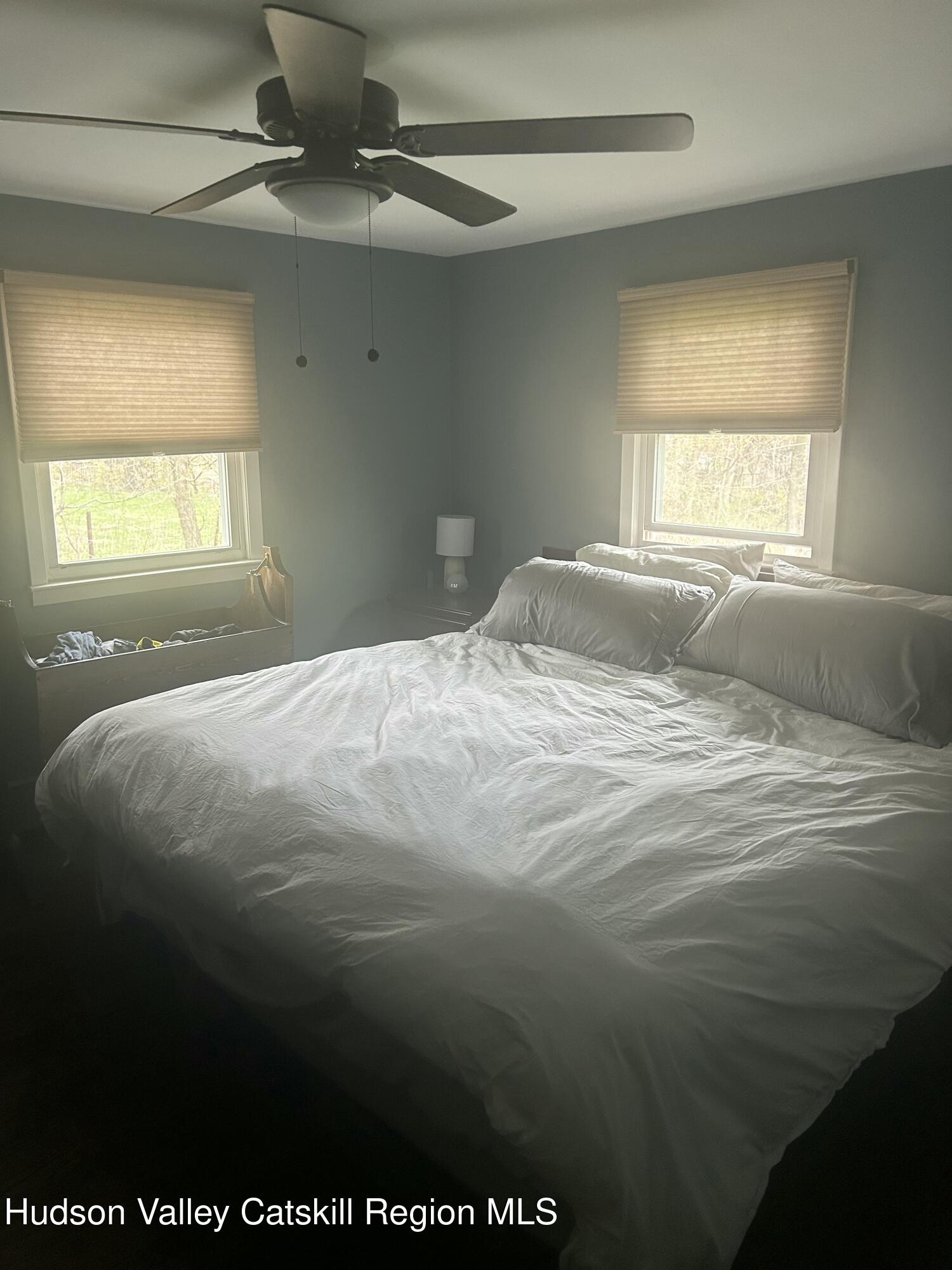 22 Caywood Road Poughkeepsie, NY 12603 - Photo 18 of 27 a bedroom with a bed and a window