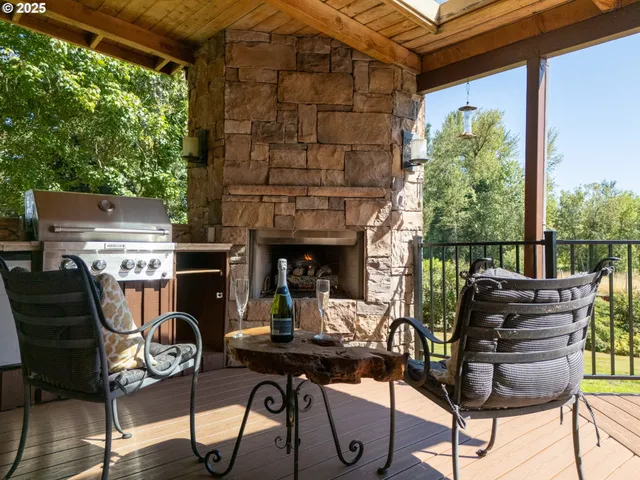 a table and chairs sitting in front of a building