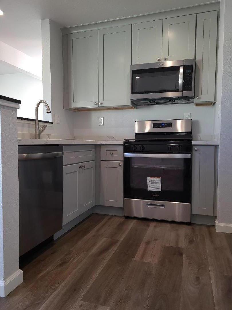2362 North Main Street, Unit 6 Salinas, CA 93906 - Photo 8 of 21 a kitchen with a stove and a microwave