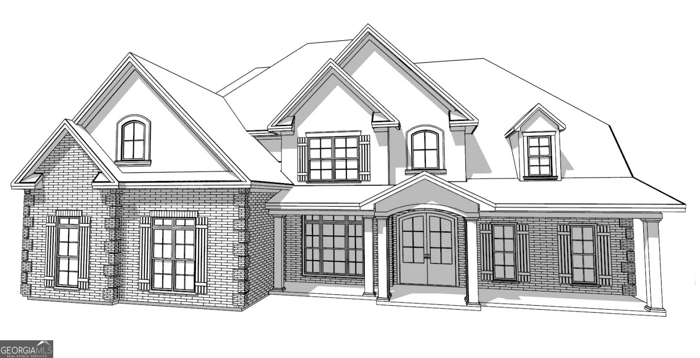 a view of a brick house with large windows