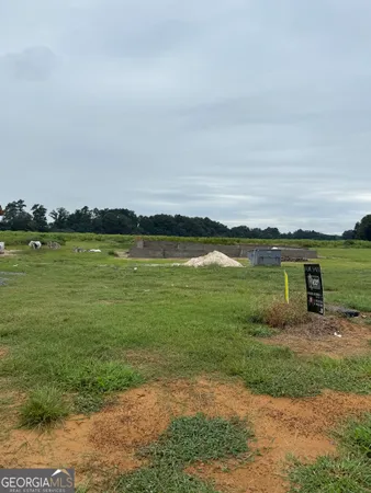 a view of a lake with a big yard