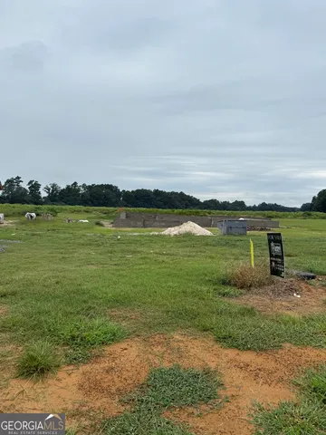 a view of a lake with a big yard