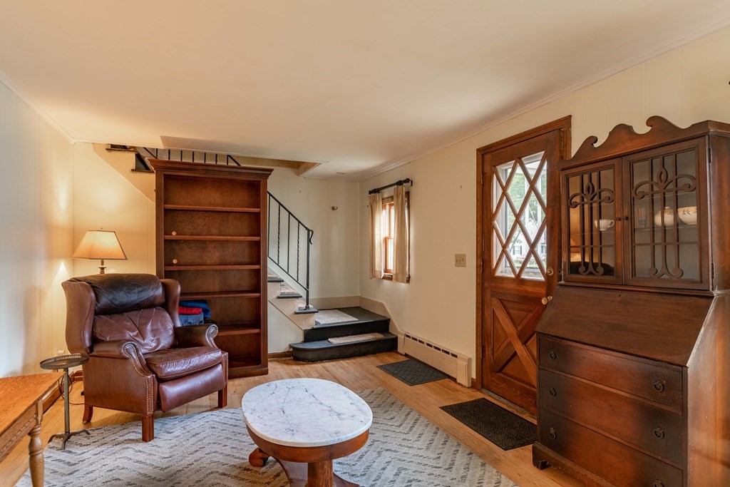 197 Bridge Road Northampton, MA 01062 - Photo 12 of 24 a living room with furniture a lamp and a rug