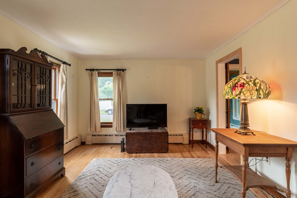 197 Bridge Road Northampton, MA 01062 - Photo 13 of 24 a bedroom with furniture and a flat screen tv
