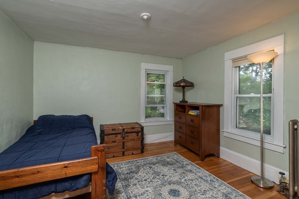 197 Bridge Road Northampton, MA 01062 - Photo 17 of 24 a bed room with a bed and a window