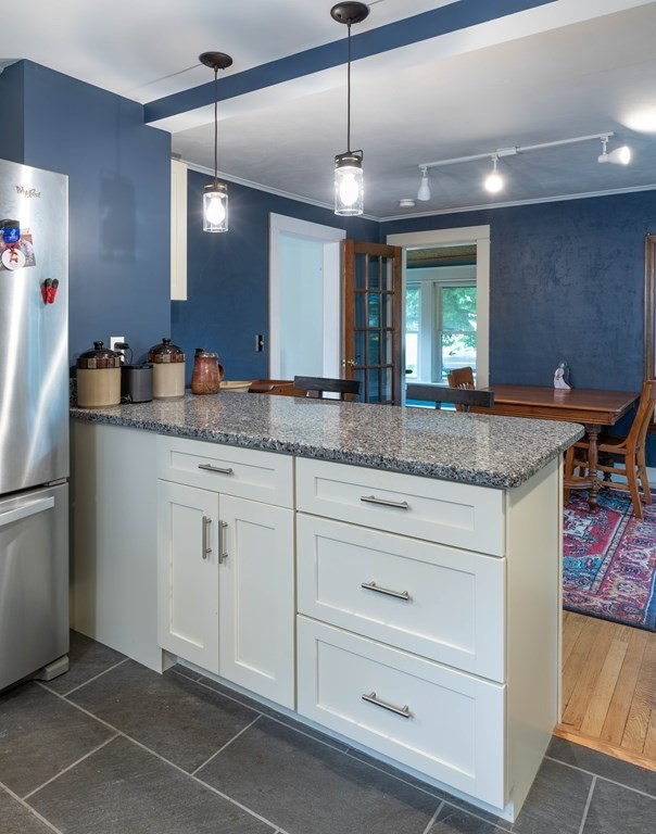 197 Bridge Road Northampton, MA 01062 - Photo 7 of 24 a bathroom with a granite countertop sink and a mirror