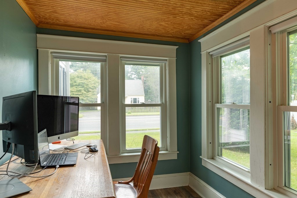 197 Bridge Road Northampton, MA 01062 - Photo 10 of 24 a living room with furniture tv and a window
