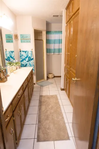 a view of balcony with a potted plant