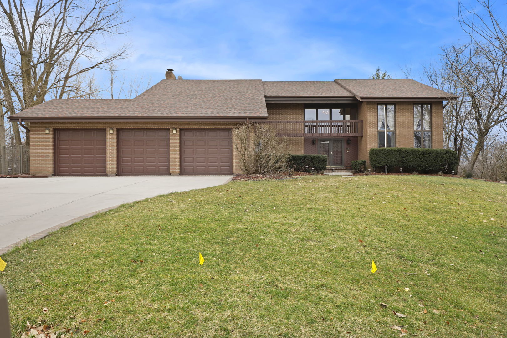 780 94th Street Burr Ridge, IL 60527 - Photo 1 of 53 a front view of a house with yard and glass windows
