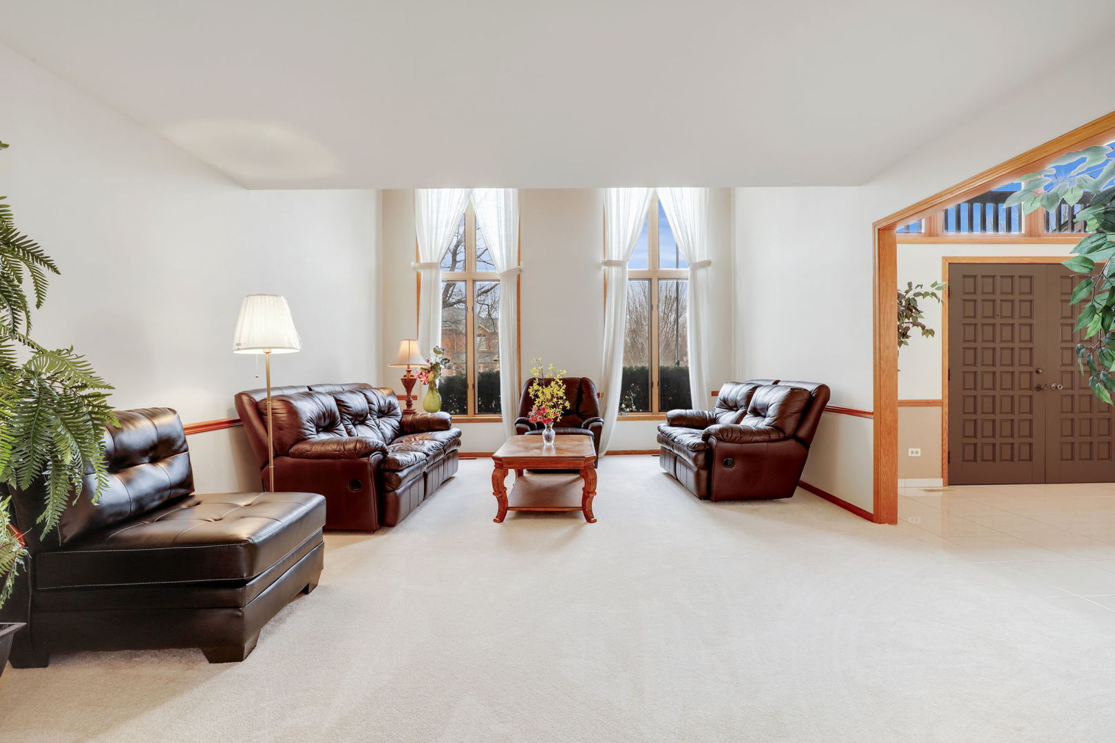 780 94th Street Burr Ridge, IL 60527 - Photo 15 of 53 a living room with furniture and a large window