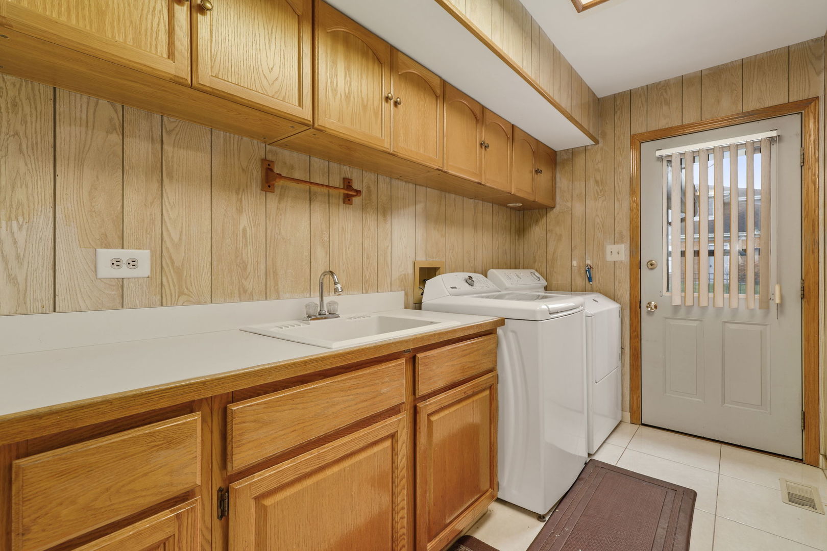 780 94th Street Burr Ridge, IL 60527 - Photo 17 of 53 a utility room with sink dryer and washer