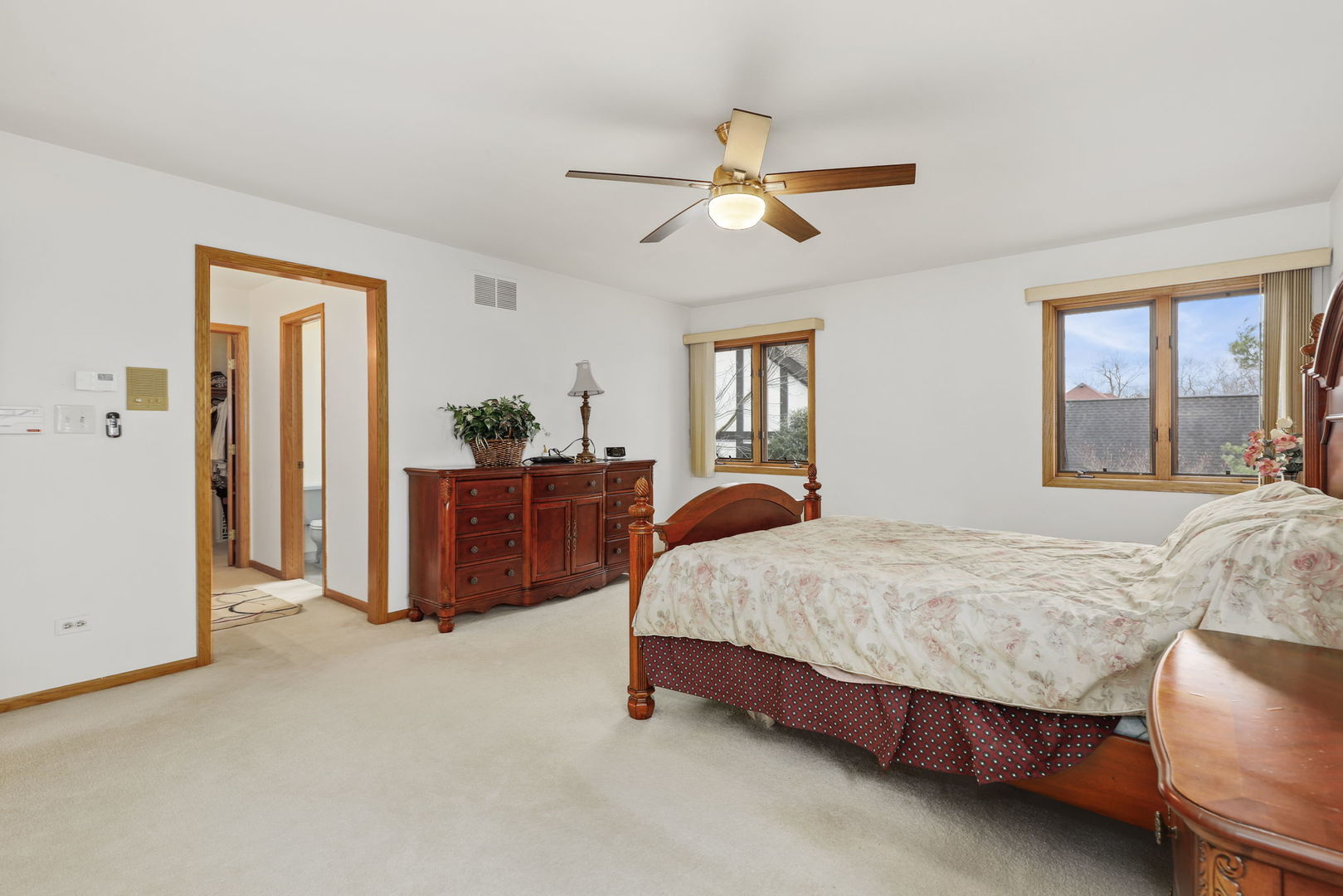 780 94th Street Burr Ridge, IL 60527 - Photo 21 of 53 a bedroom with a bed and window