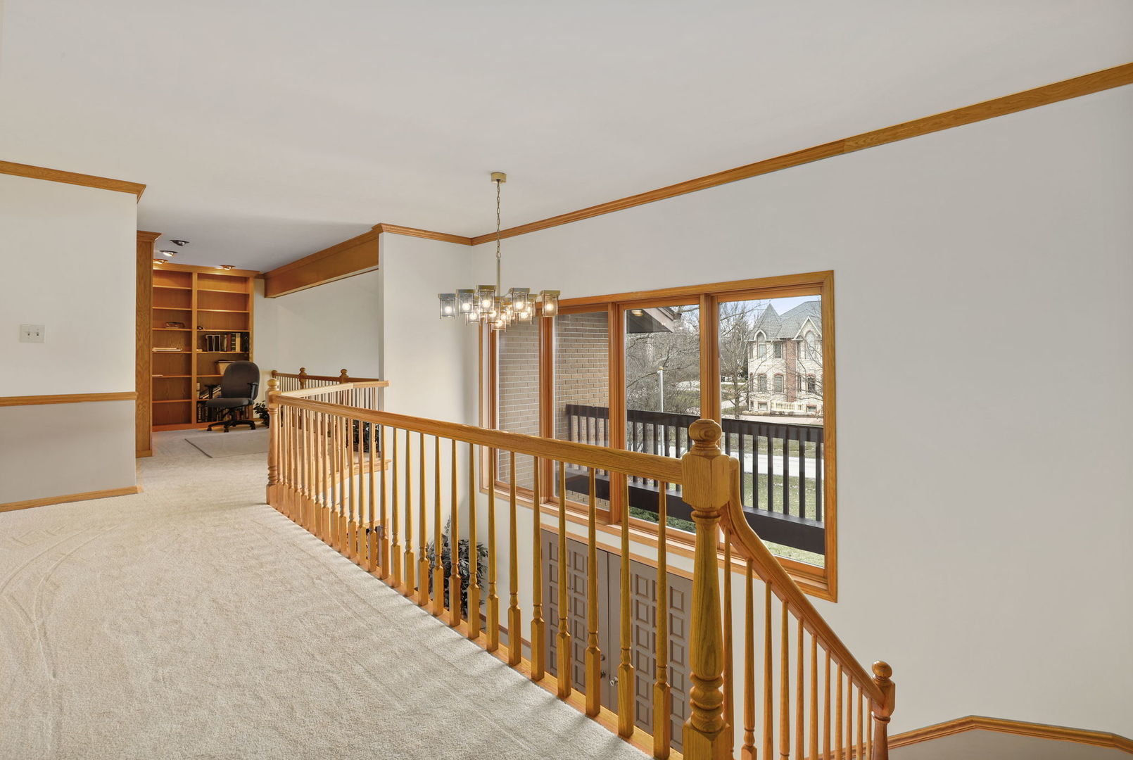 780 94th Street Burr Ridge, IL 60527 - Photo 34 of 53 a view of a hallway with windows