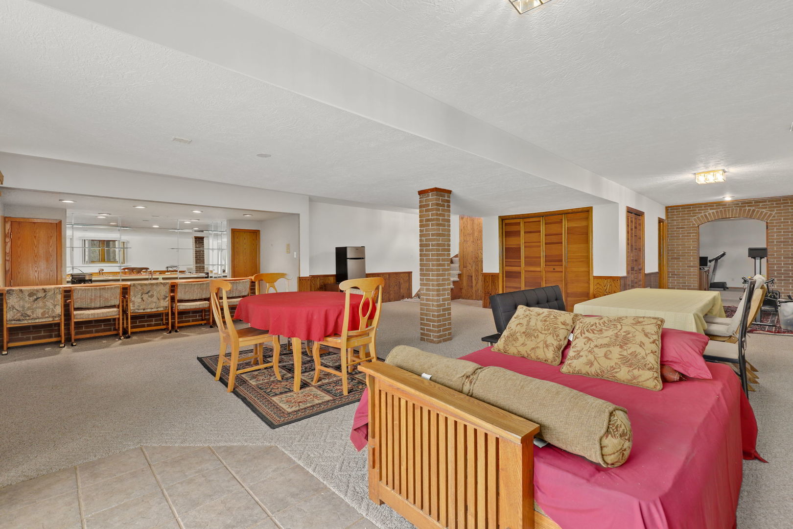 780 94th Street Burr Ridge, IL 60527 - Photo 37 of 53 a bedroom with furniture and a large window