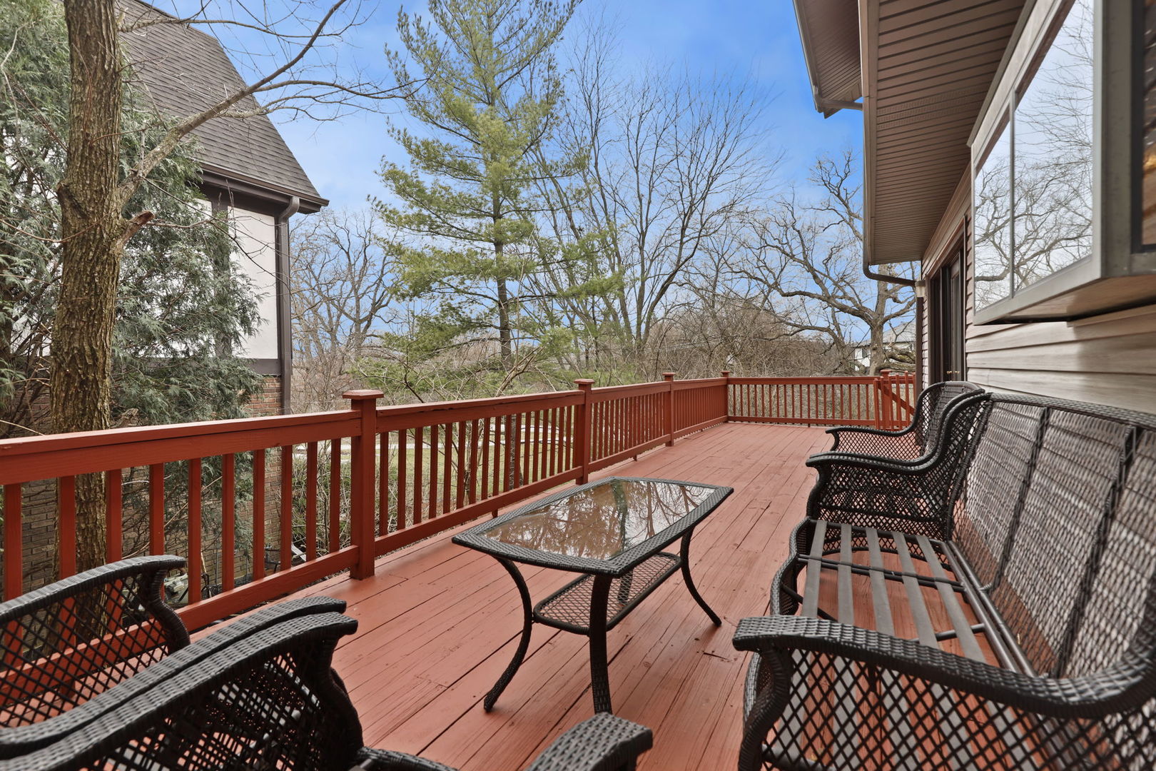 780 94th Street Burr Ridge, IL 60527 - Photo 44 of 53 a view of balcony with wooden floor and outdoor seating