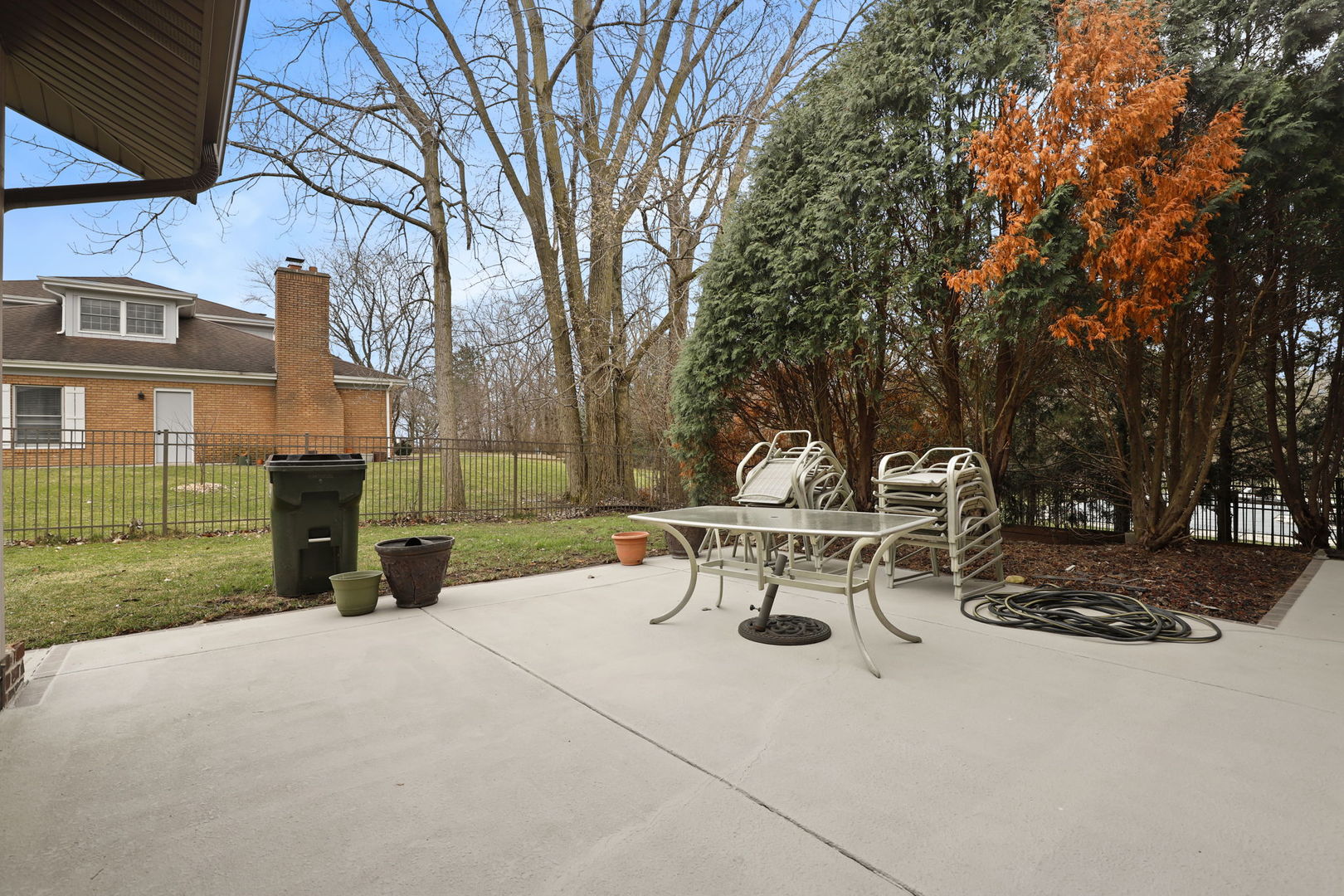 780 94th Street Burr Ridge, IL 60527 - Photo 48 of 53 a view of a park with bench and a fire pit