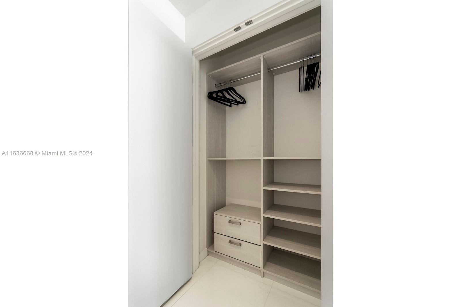 851 Northeast 1st Avenue, Unit 1710 Miami, FL 33132 - Photo 21 of 26 a close view of a closet