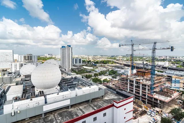 a view of living room with furniture and flat screen tv