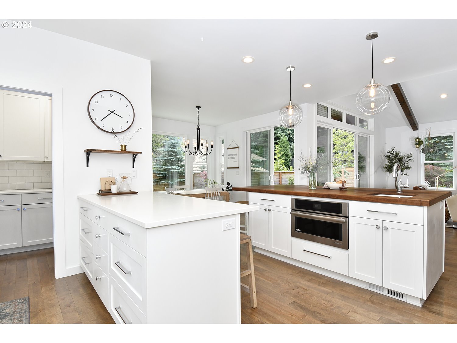 774 Southeast 25th Street Gresham, OR 97080 - Photo 12 of 39 a kitchen with stainless steel appliances granite countertop a stove and a sink