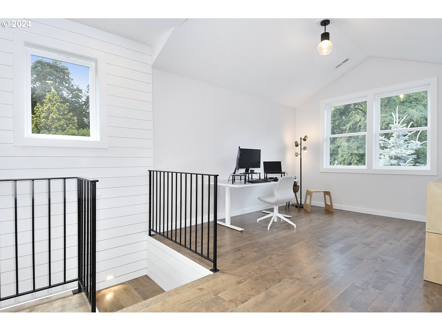 774 Southeast 25th Street Gresham, OR 97080 - Photo 20 of 39 a view of a living room hardwood floor and a window
