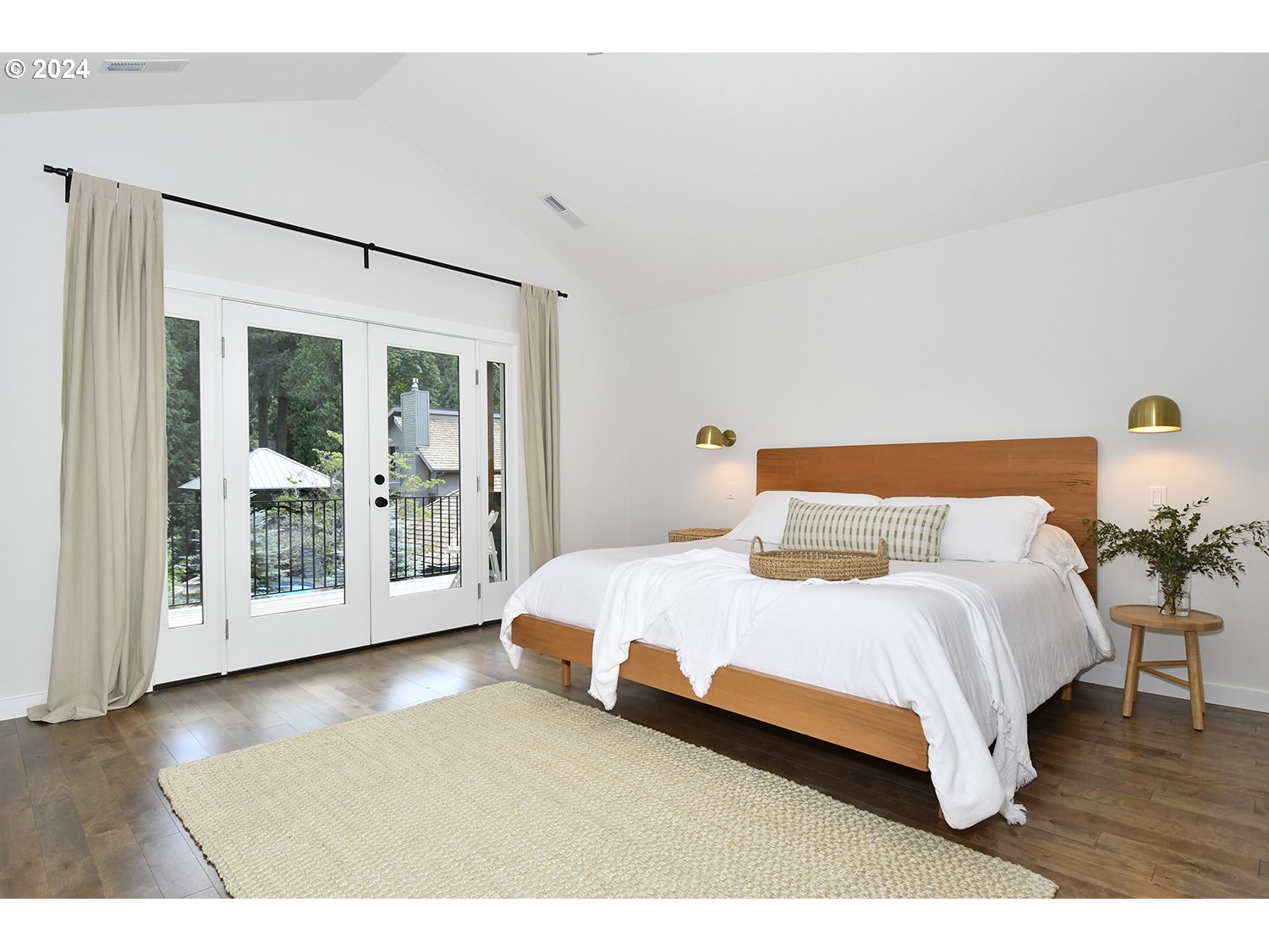 774 Southeast 25th Street Gresham, OR 97080 - Photo 21 of 39 a bedroom with a large bed and a large window