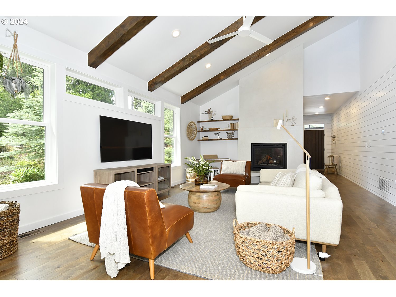774 Southeast 25th Street Gresham, OR 97080 - Photo 7 of 39 a living room with furniture a flat screen tv and a large window