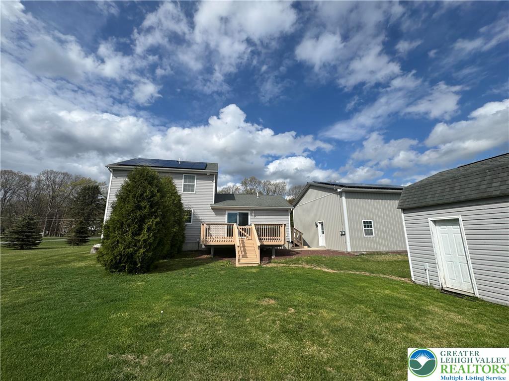 18 Cub Lane Jim Thorpe, PA 18229 - Photo 12 of 58 a view of a house with backyard and a garden