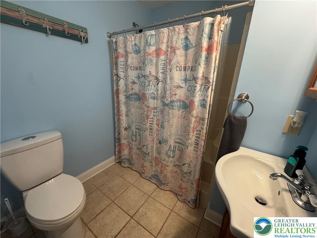 18 Cub Lane Jim Thorpe, PA 18229 - Photo 39 of 58 a bathroom with a sink toilet and shower