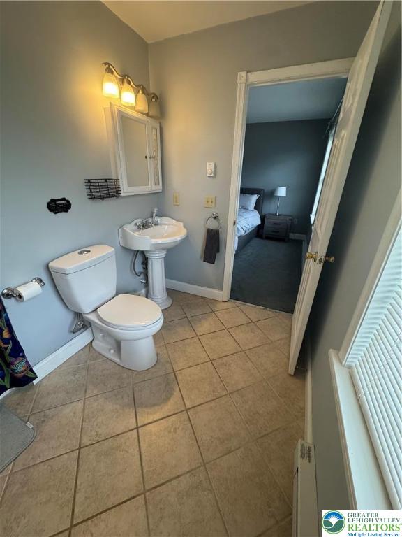 18 Cub Lane Jim Thorpe, PA 18229 - Photo 43 of 58 a bathroom with a sink toilet and mirror