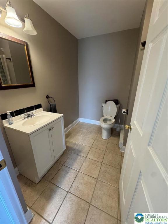 18 Cub Lane Jim Thorpe, PA 18229 - Photo 48 of 58 a utility room with a sink a toilet and a mirror