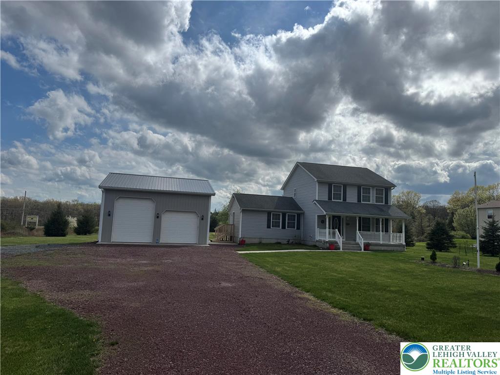 18 Cub Lane Jim Thorpe, PA 18229 - Photo 9 of 58 a view of a house with a big yard and large trees