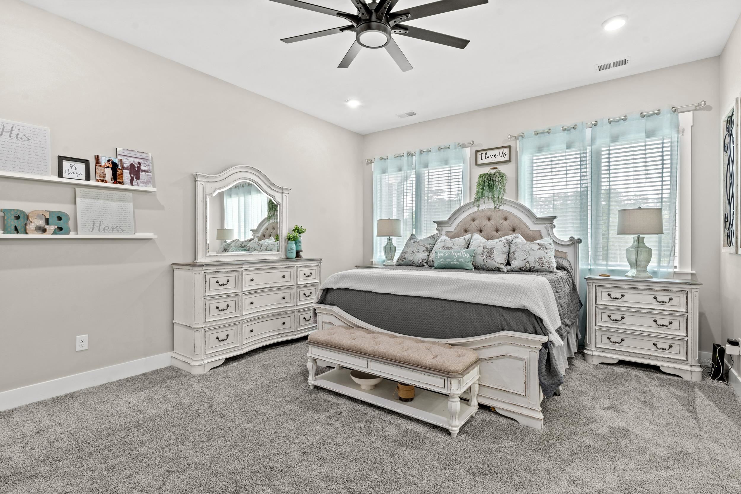 411 Chamberlin Road Myrtle Beach, SC 29588 - Photo 16 of 40 Bedroom featuring light colored carpet and ceiling fan