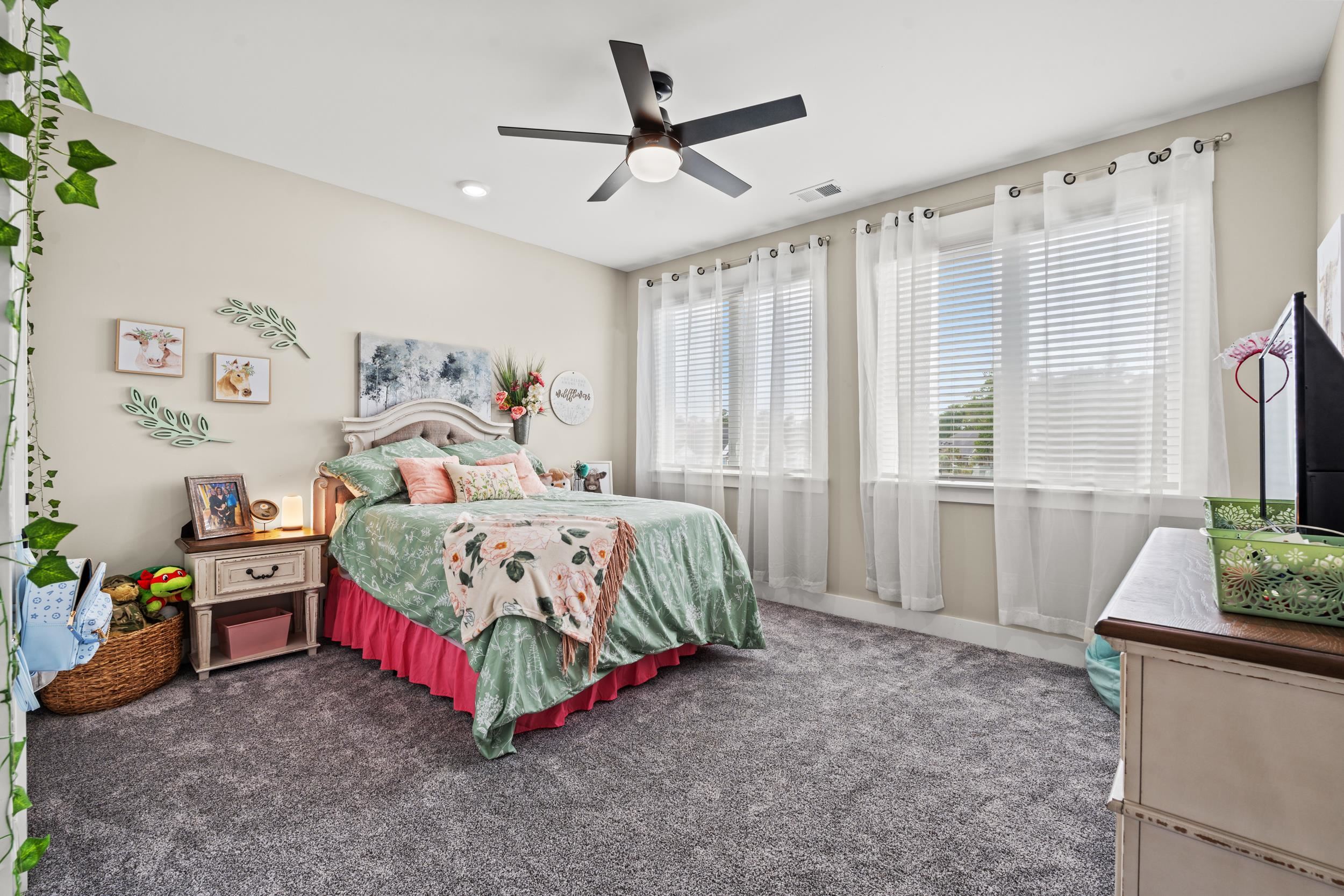 411 Chamberlin Road Myrtle Beach, SC 29588 - Photo 25 of 40 Carpeted bedroom with a ceiling fan and baseboards