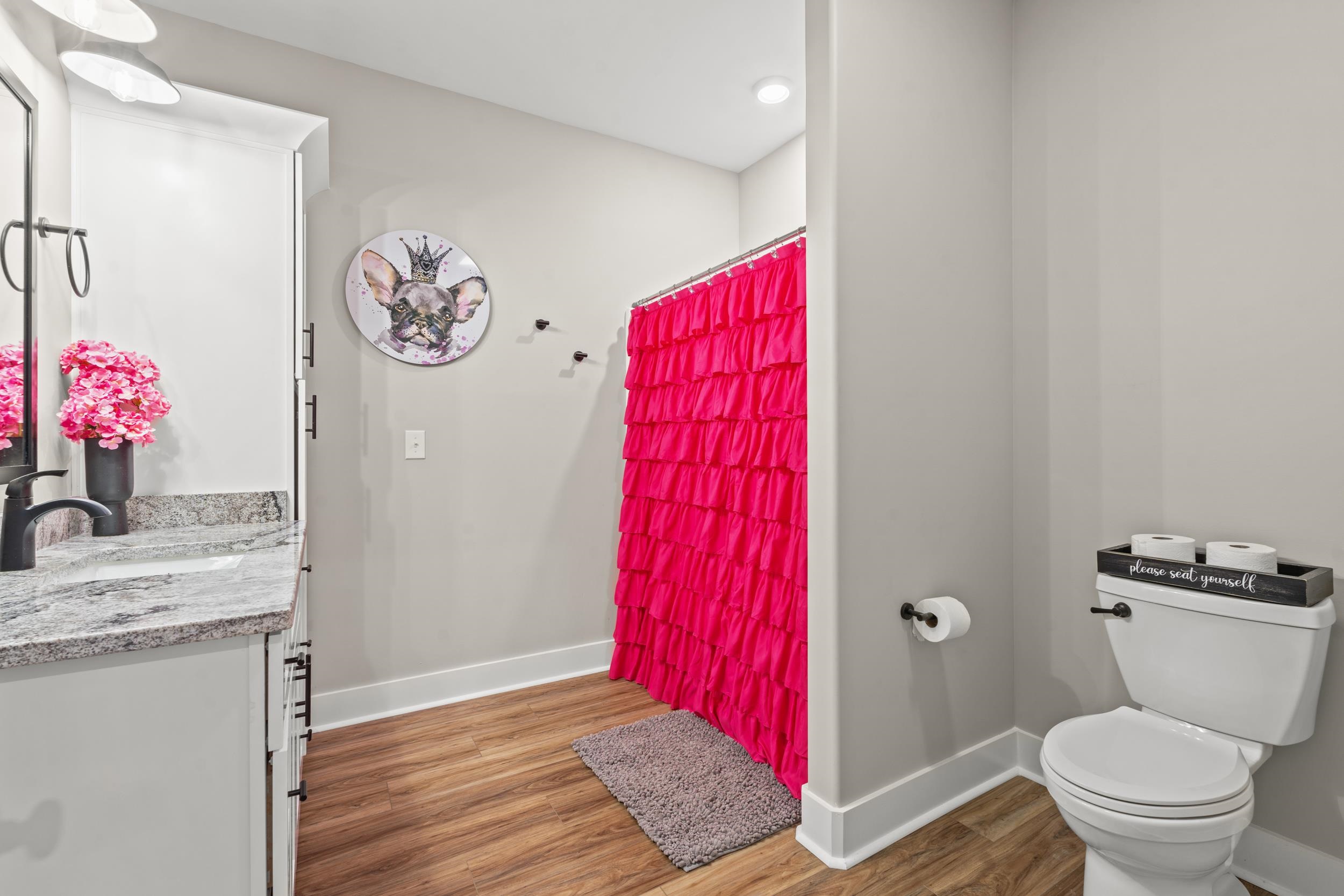 411 Chamberlin Road Myrtle Beach, SC 29588 - Photo 27 of 40 Full bath featuring vanity, curtained shower, and light wood-type flooring