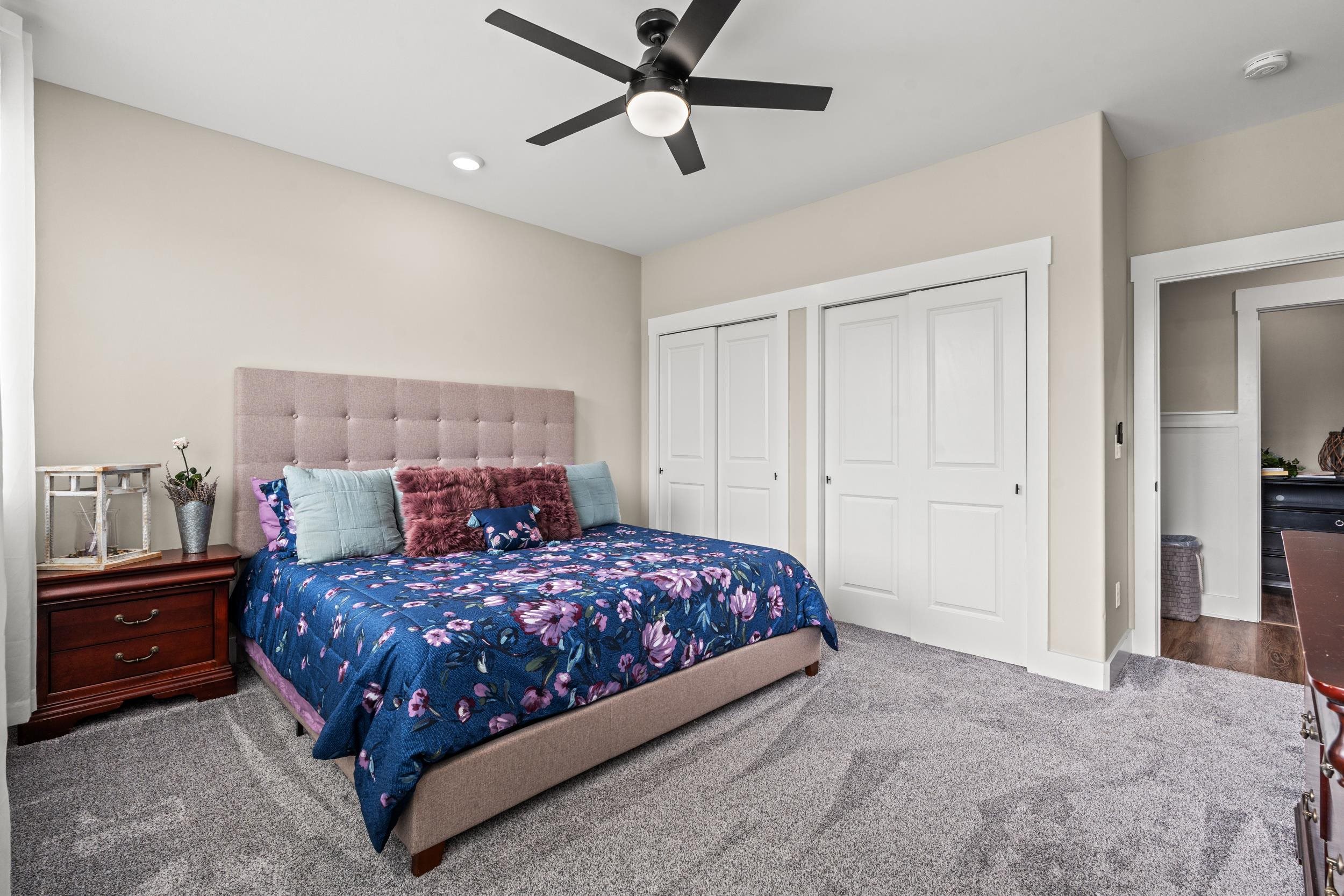 411 Chamberlin Road Myrtle Beach, SC 29588 - Photo 28 of 40 Carpeted bedroom featuring two closets and ceiling fan