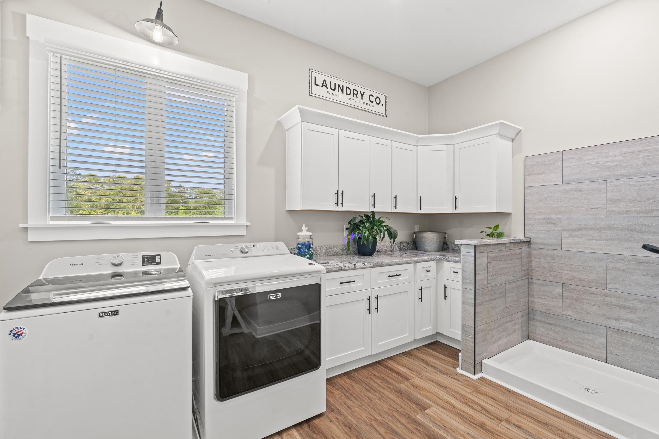 411 Chamberlin Road Myrtle Beach, SC 29588 - Photo 30 of 40 Washroom featuring washer and dryer and light wood finished floors