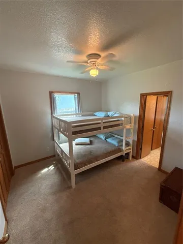 a view of a livingroom with a staircase