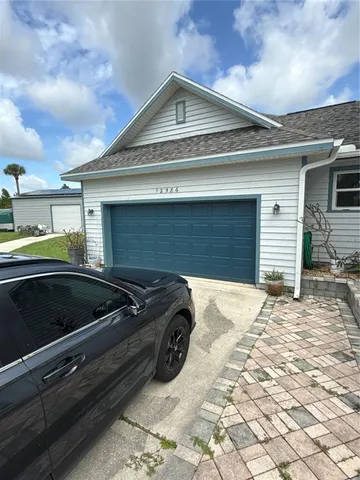 a car parked in front of a house