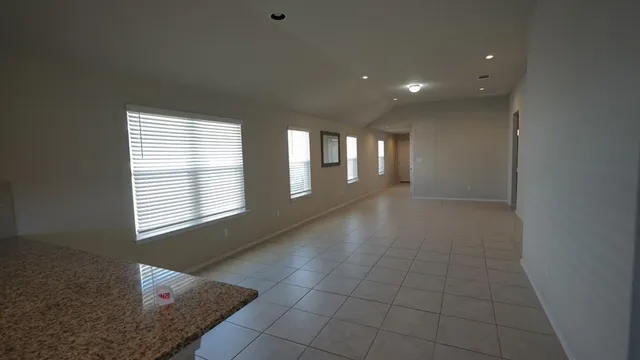 en empty room with windows