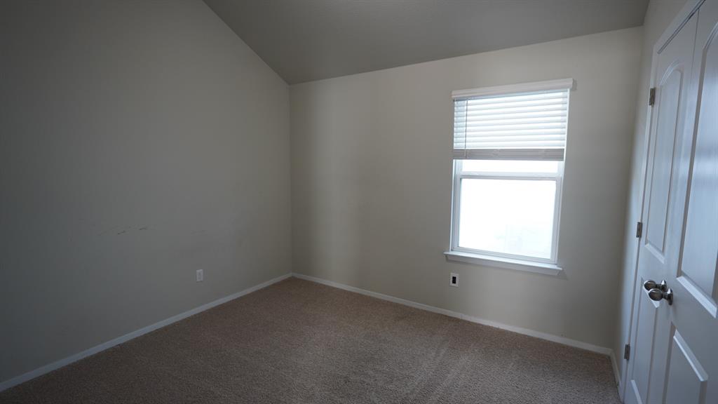 251 Tempest Trail Maxwell, TX 78656 - Photo 8 of 15 an empty room with a window