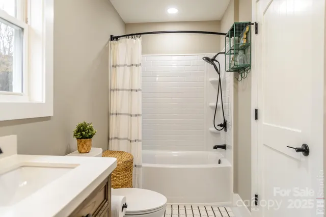 a bathroom with a sink a vanity and a mirror