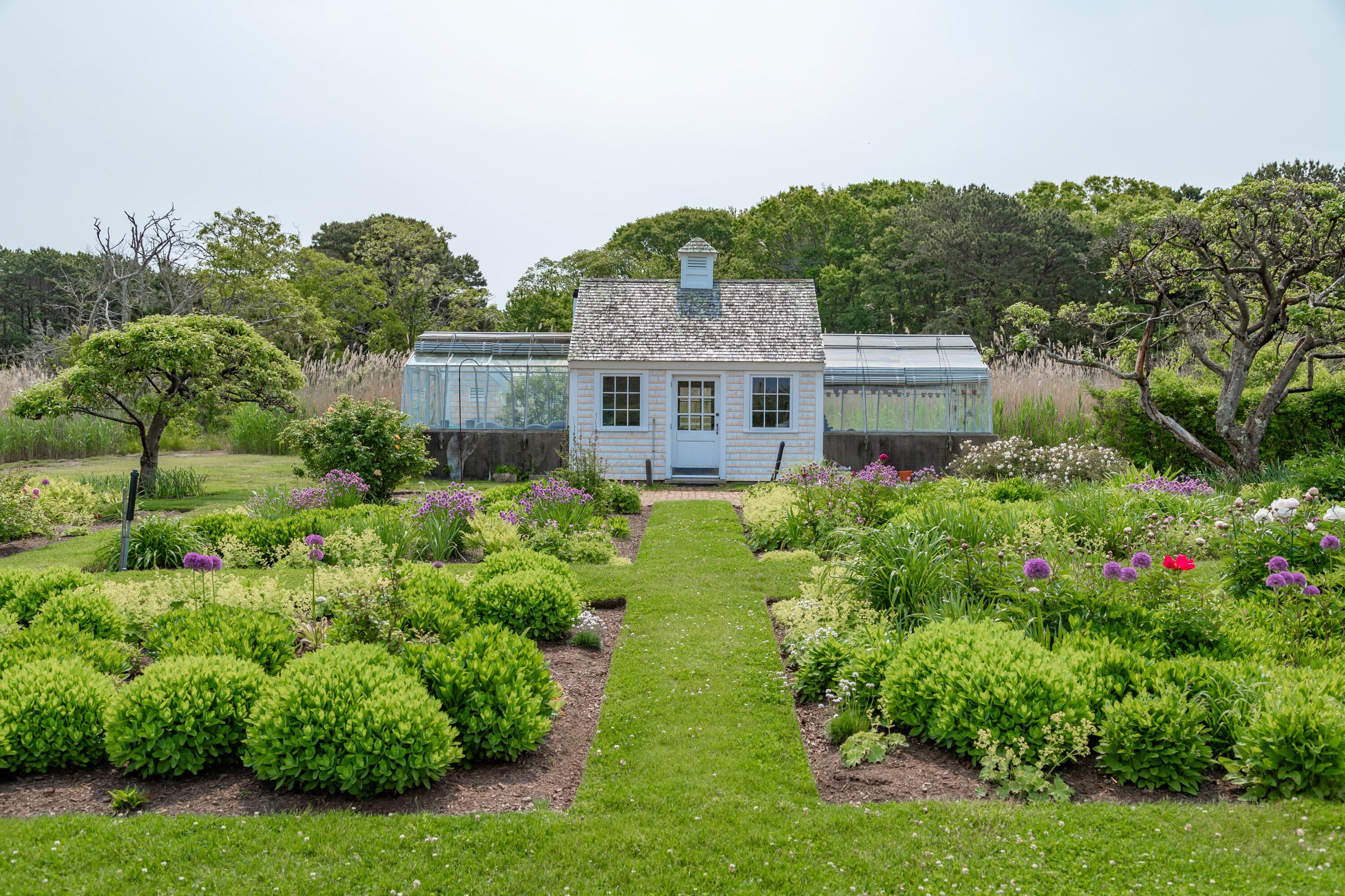 17 Indian Trail Osterville, MA 02655 - Photo 11 of 19 a view of a house with a garden