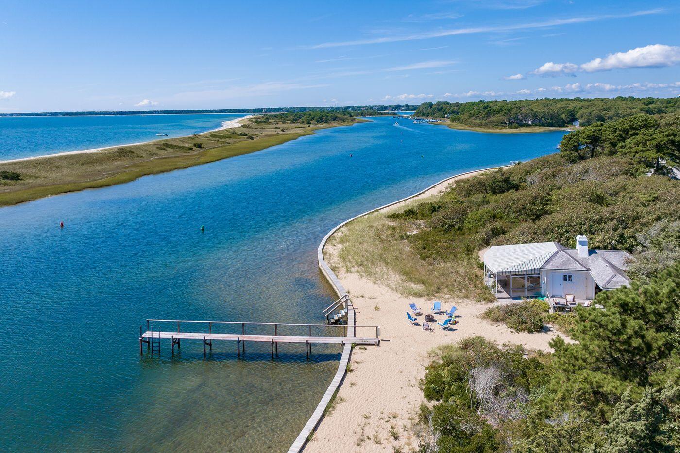 17 Indian Trail Osterville, MA 02655 - Photo 15 of 19 a view of a swimming pool with an ocean view