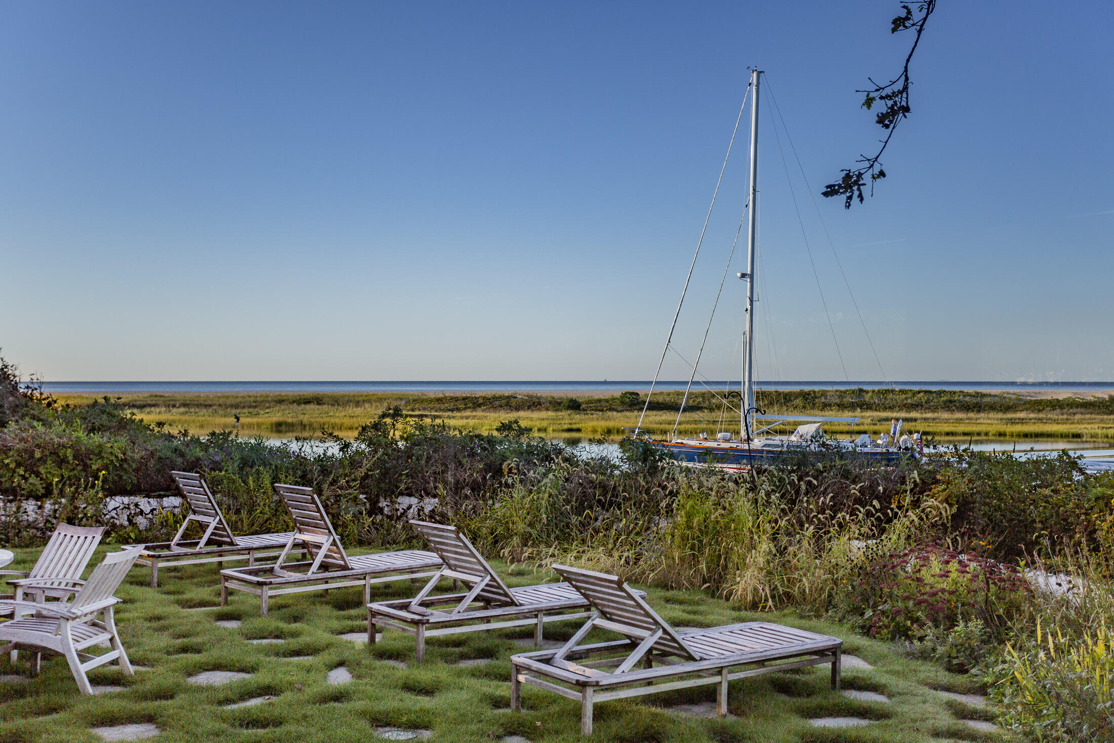 17 Indian Trail Osterville, MA 02655 - Photo 17 of 19 a view of a swimming pool with lawn chairs